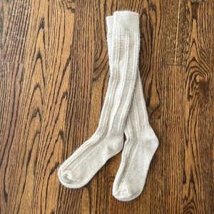 Brand new, knee high socks. Never worn, extremely soft, fits women’s size 5-7.
